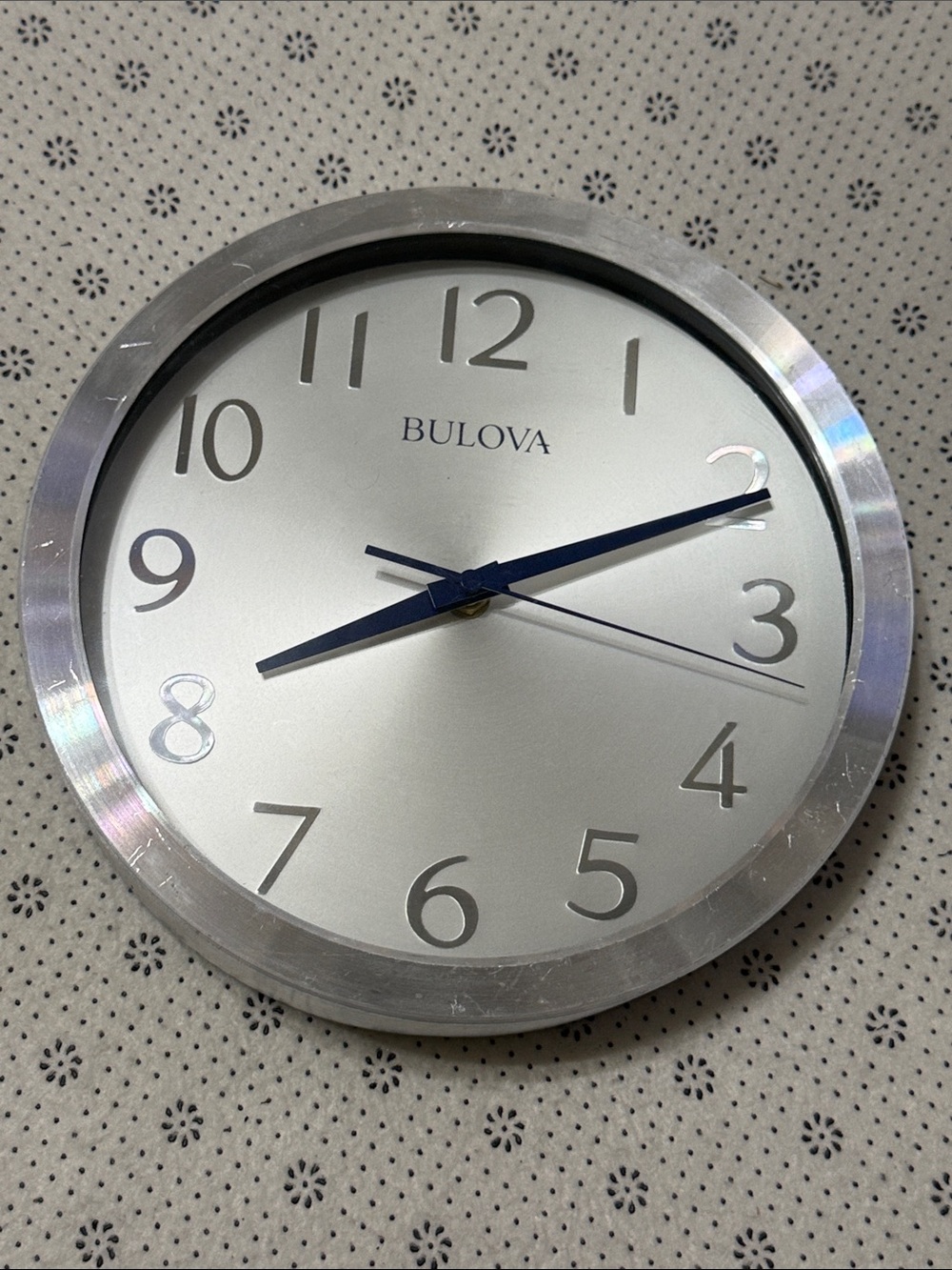 Bulova Silver Wall Clock with Blue Hands and Silver Dial